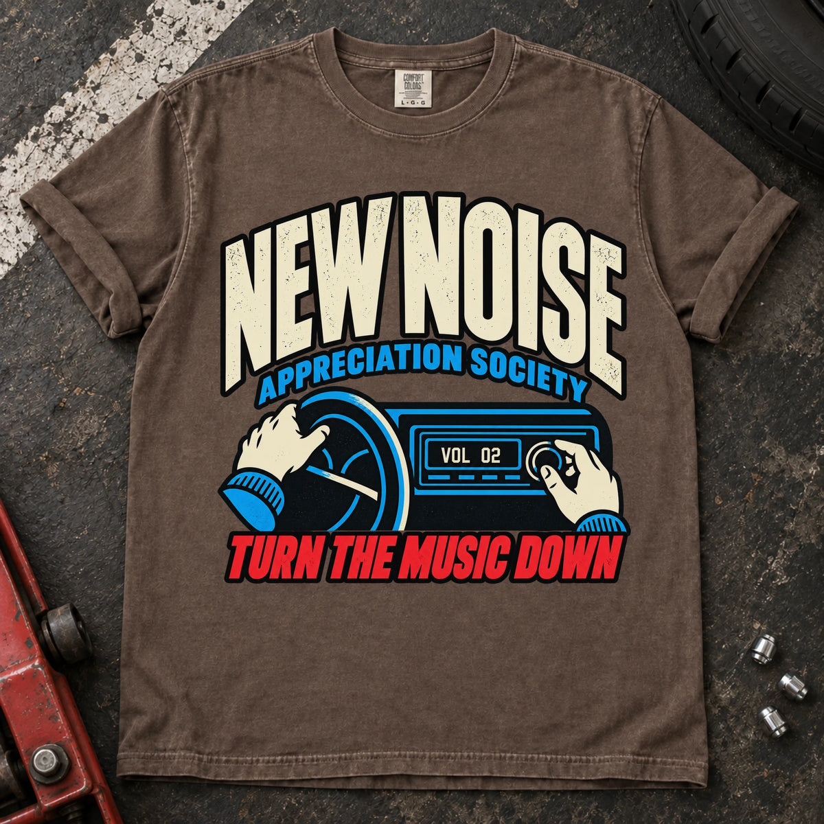 Espresso car enthusiast T-shirt. Hands lower the stereo for the New Noise Appreciation Society.