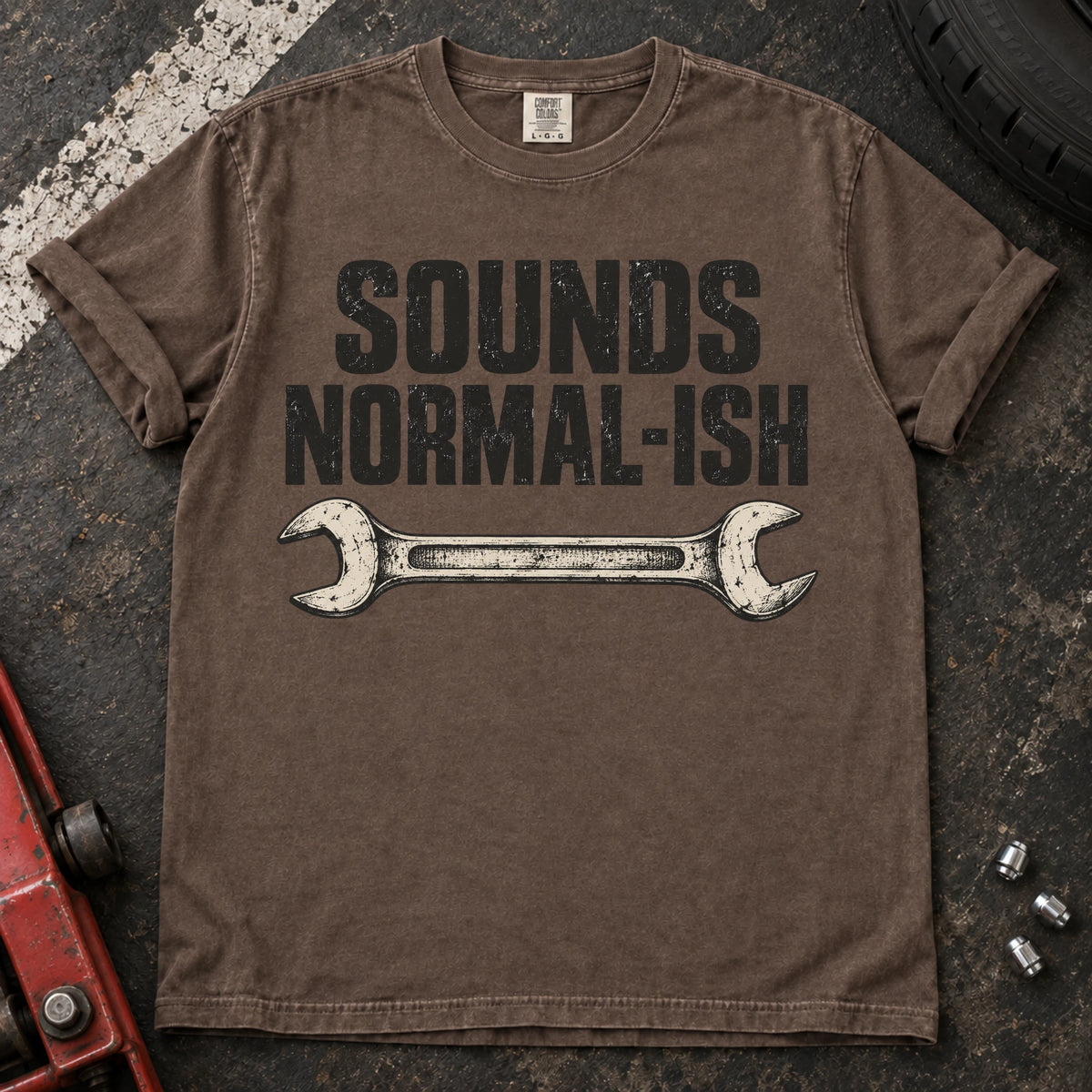 Espresso car enthusiast T-shirt. A worn wrench gives sounds normal-ish a mechanic's cautious reassurance.