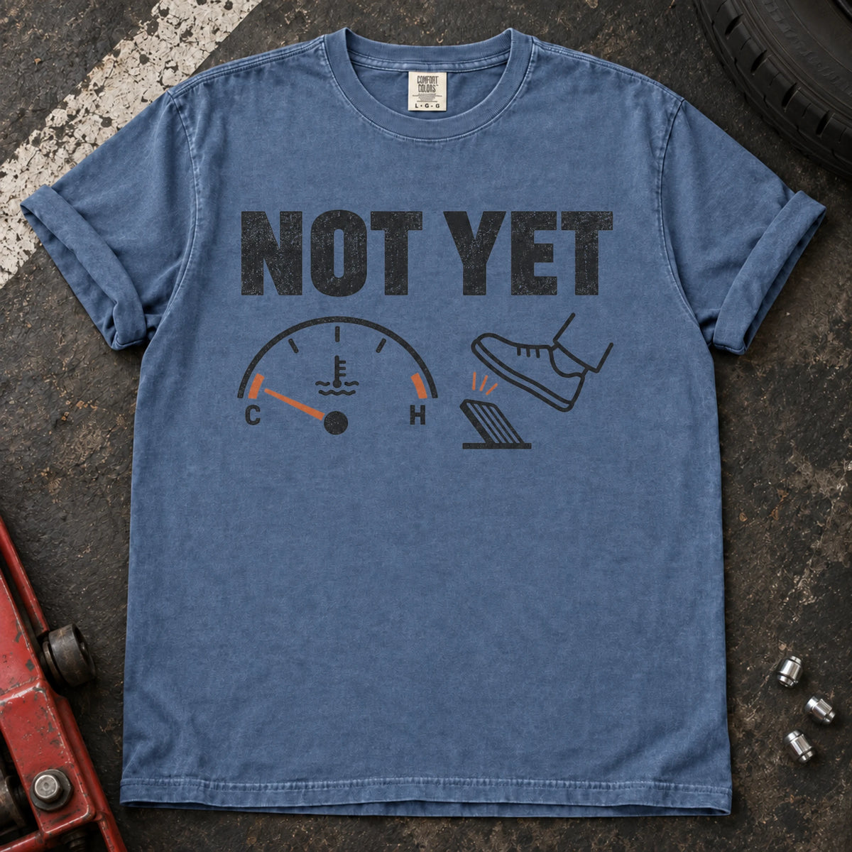 Blue Jean car enthusiast T-shirt. A temperature gauge tells the impatient right foot, not yet.