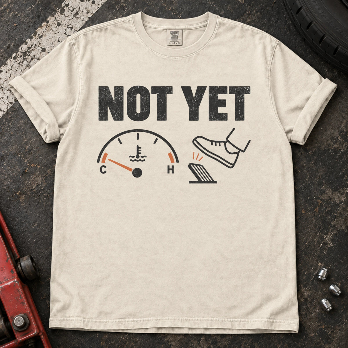Ivory car enthusiast T-shirt. A temperature gauge tells the impatient right foot, not yet.