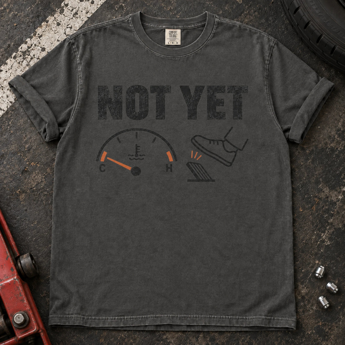 Pepper car enthusiast T-shirt. A temperature gauge tells the impatient right foot, not yet.