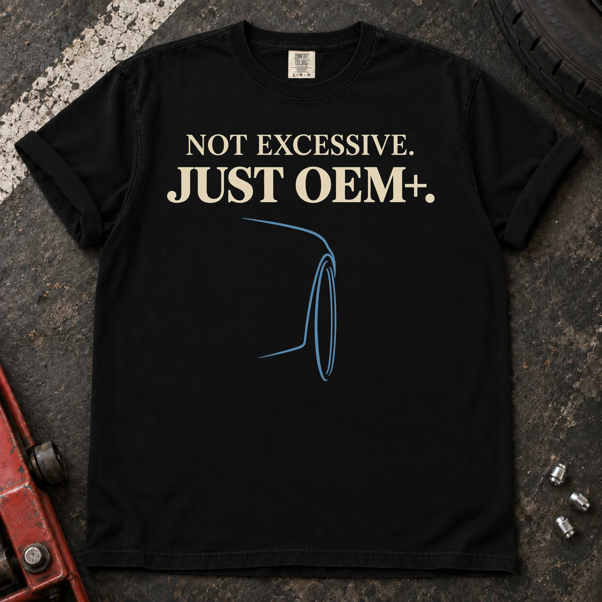 Black car enthusiast T-shirt. A wheel outline backs not excessive, just OEM+.