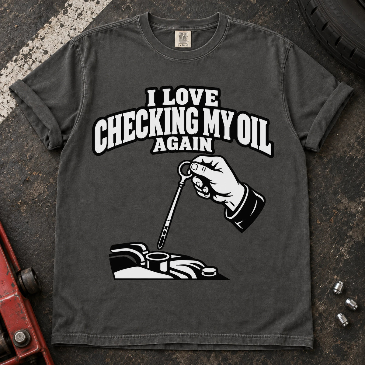 Pepper T-shirt showing a hand checking an engine dipstick under 'I love checking my oil again'.