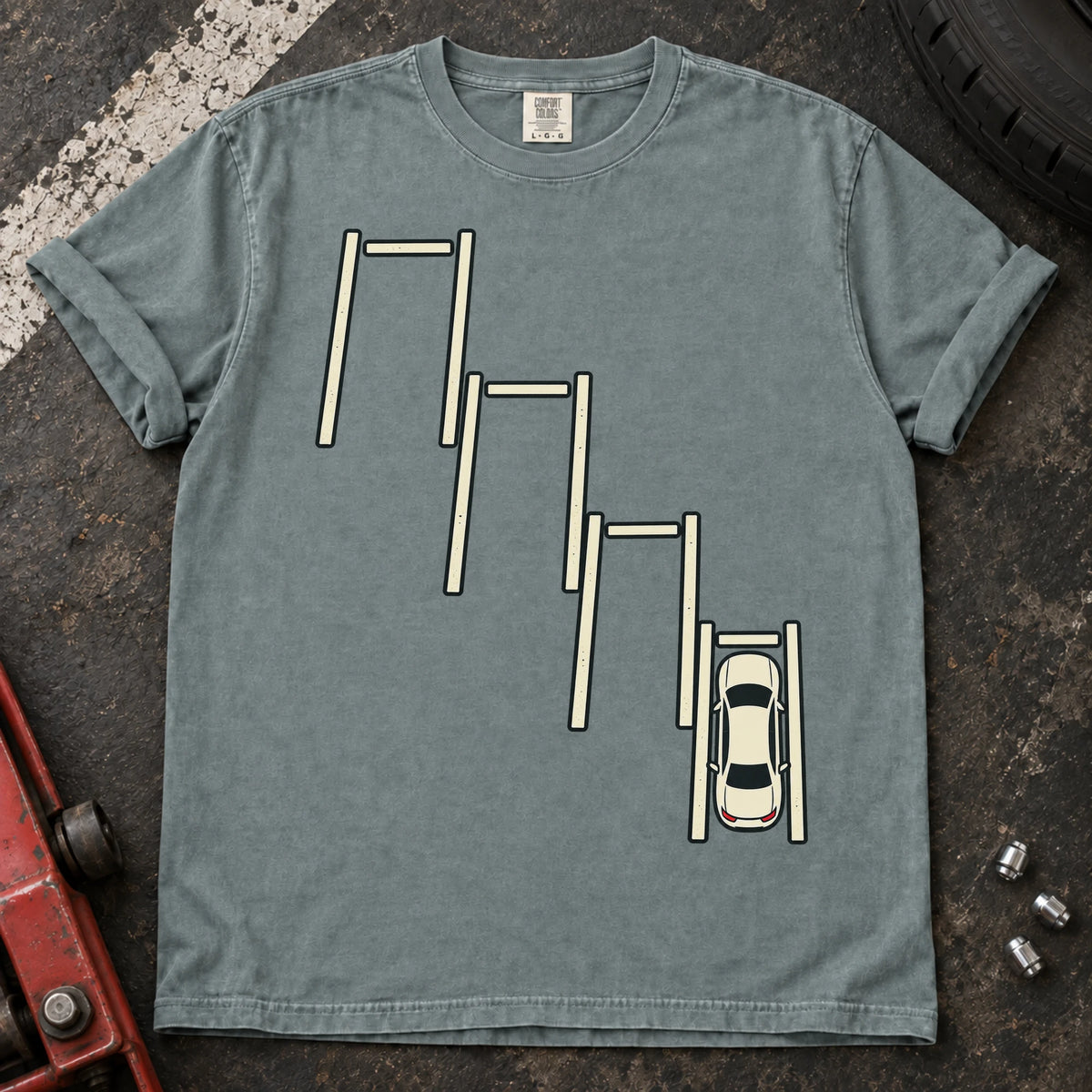 Bay car enthusiast T-shirt. A top-down car sits precisely among staggered parking bays.