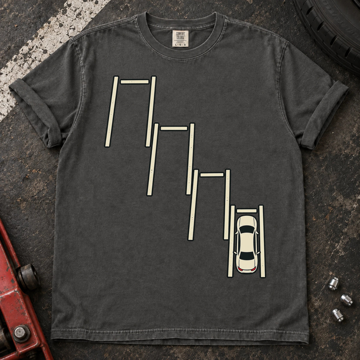 Pepper car enthusiast T-shirt. A top-down car sits precisely among staggered parking bays.