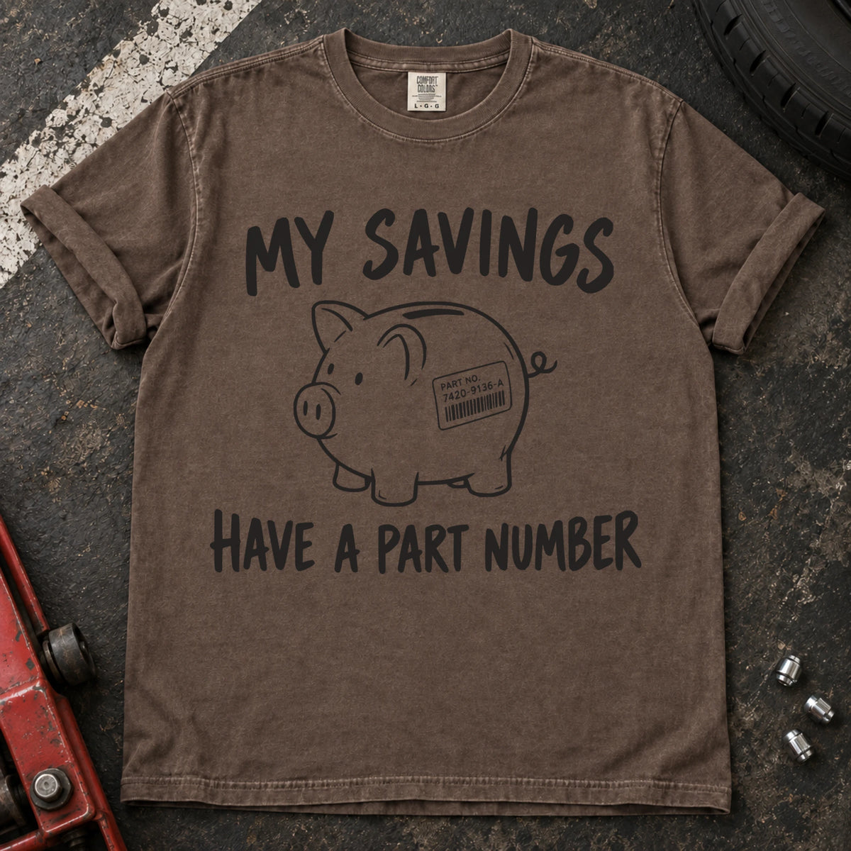 Espresso T-shirt showing a piggy bank with a parts label beneath 'My savings have a part number'.