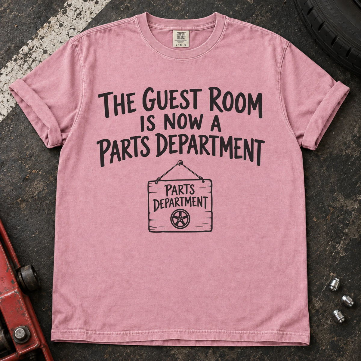 Blossom T-shirt showing a Parts Department sign beneath 'The guest room is now a parts department'.