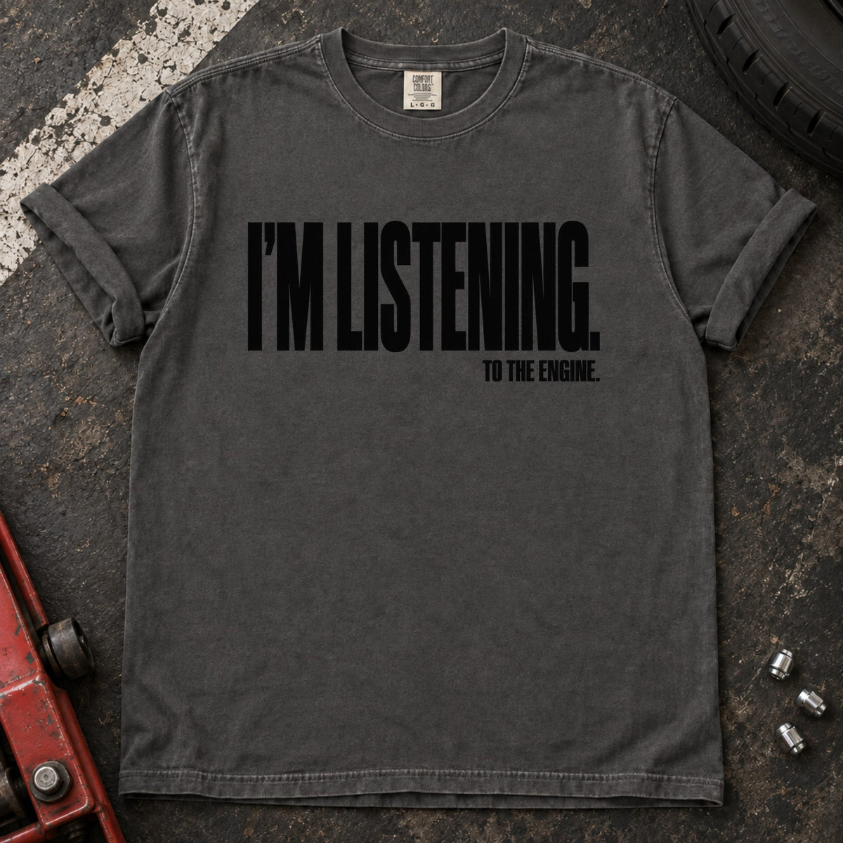 Pepper T-shirt with bold condensed lettering reading 'I'm listening to the engine'.