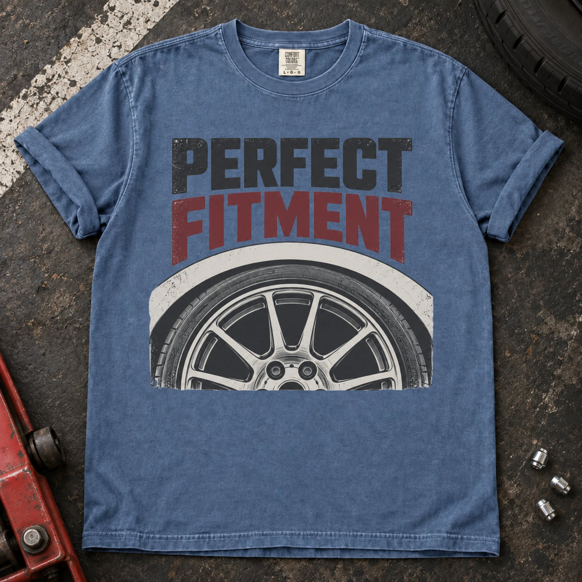 Blue Jean car enthusiast T-shirt. A close-up wheel celebrates the pursuit of perfect fitment.