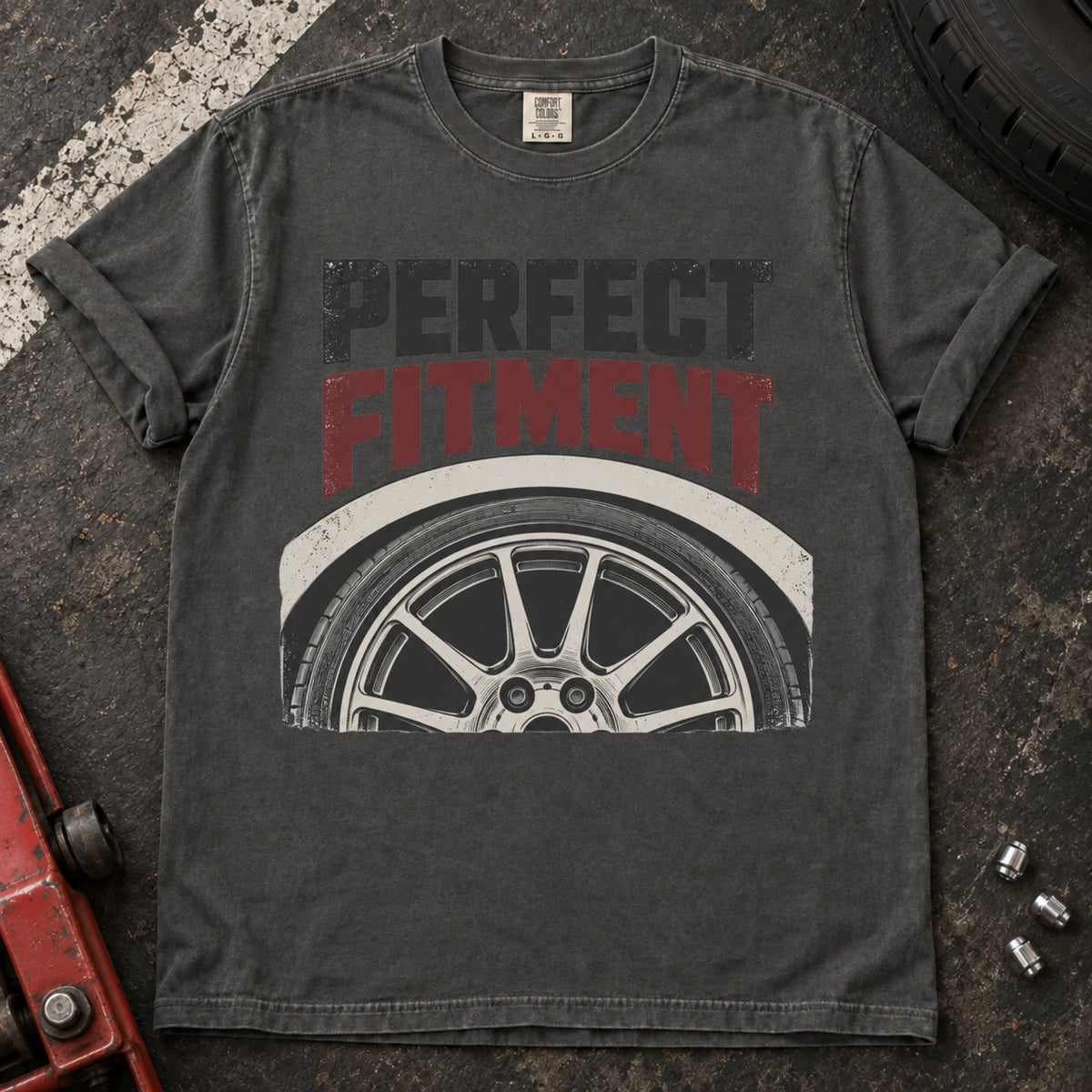 Pepper car enthusiast T-shirt. A close-up wheel celebrates the pursuit of perfect fitment.