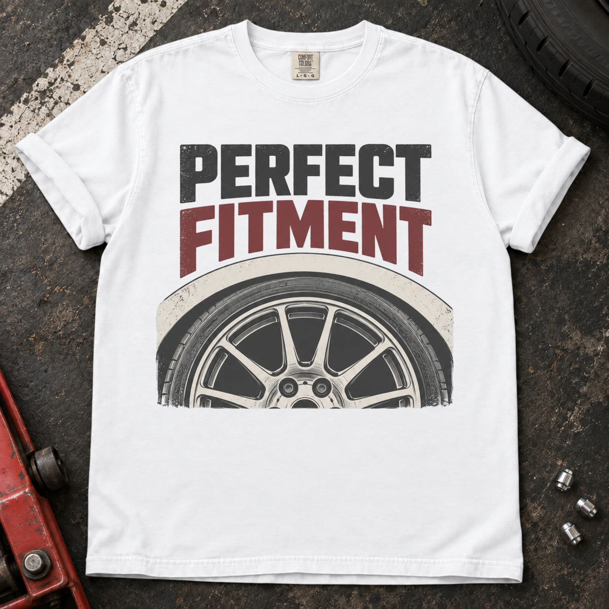 White car enthusiast T-shirt. A close-up wheel celebrates the pursuit of perfect fitment.