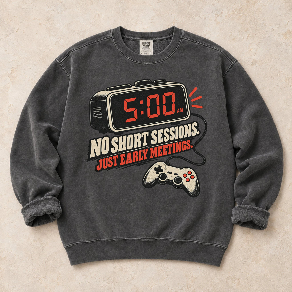 Pepper gaming sweatshirt. An early alarm and controller show there are no short sessions, just early meetings.