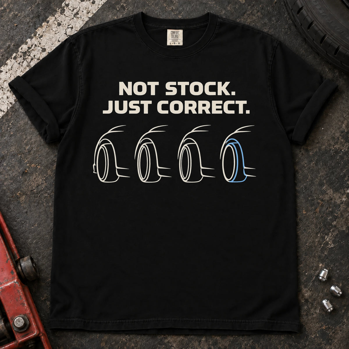 Black car enthusiast T-shirt. Four wheel profiles argue not stock, just correct.