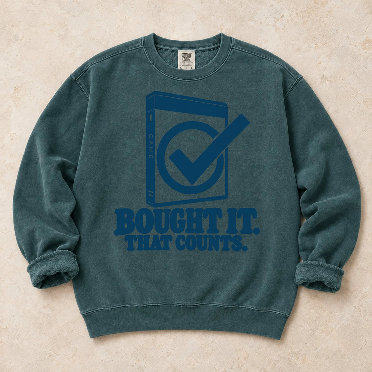 Blue Spruce gaming sweatshirt. A checked game case argues bought it, that counts.