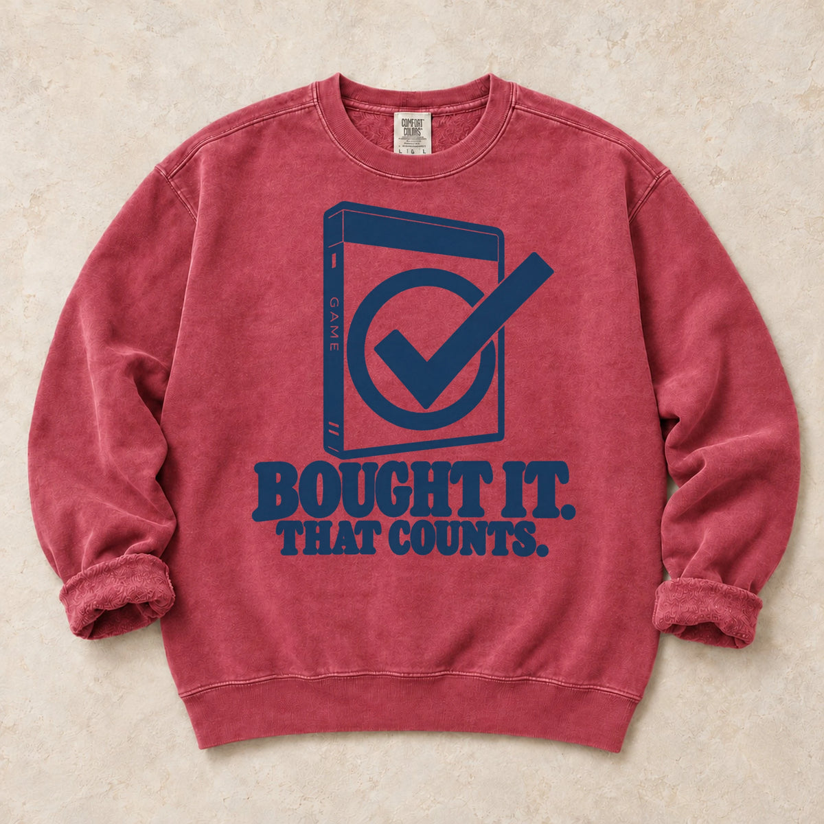 Crimson gaming sweatshirt. A checked game case argues bought it, that counts.
