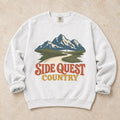 White gaming sweatshirt. A winding mountain path welcomes explorers to side quest country.