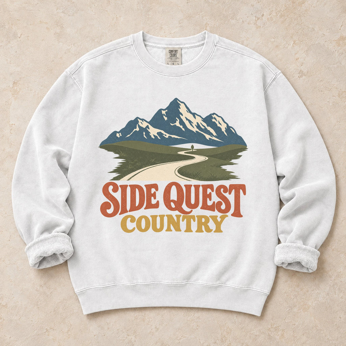 White gaming sweatshirt. A winding mountain path welcomes explorers to side quest country.