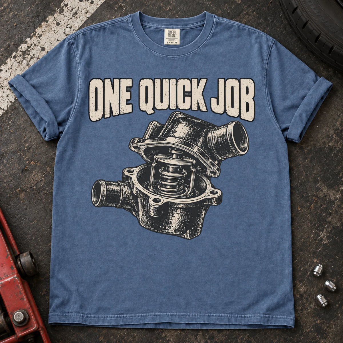 Blue Jean car enthusiast T-shirt. An opened thermostat assembly questions the promise of one quick job.