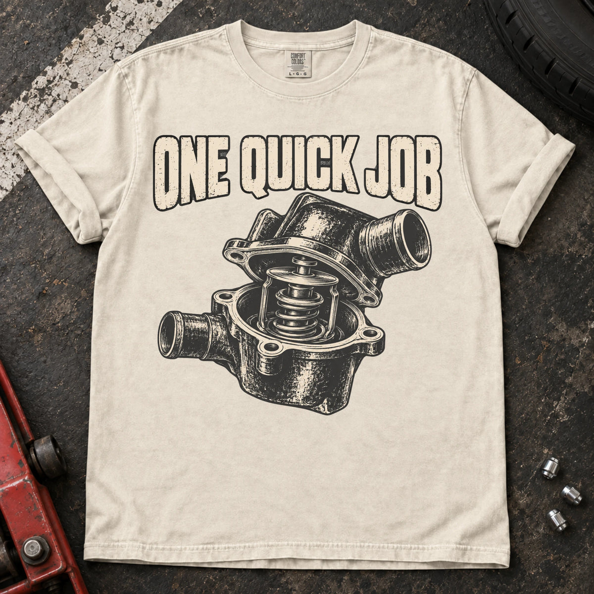 Ivory car enthusiast T-shirt. An opened thermostat assembly questions the promise of one quick job.