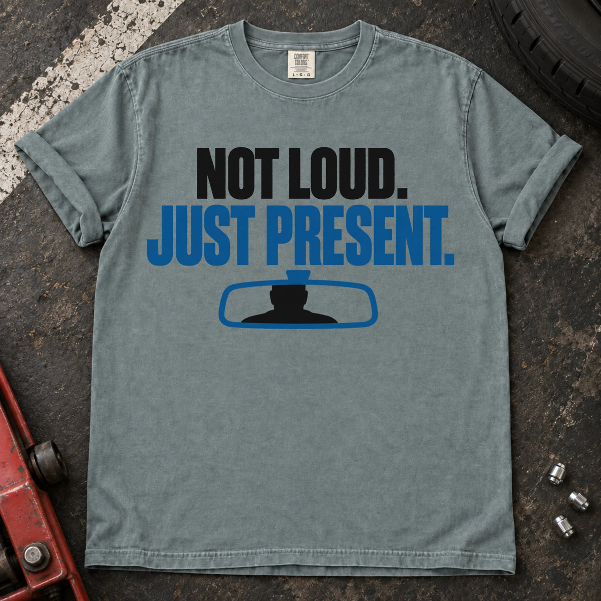 Bay car enthusiast T-shirt. A rearview mirror backs not loud, just present.