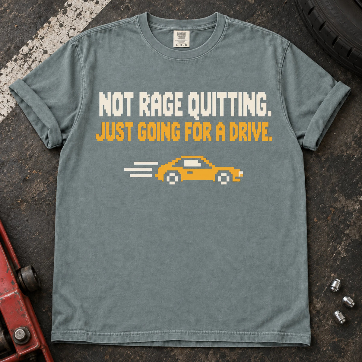 Bay car enthusiast T-shirt. A pixel car drives away: not rage quitting, just going for a drive.