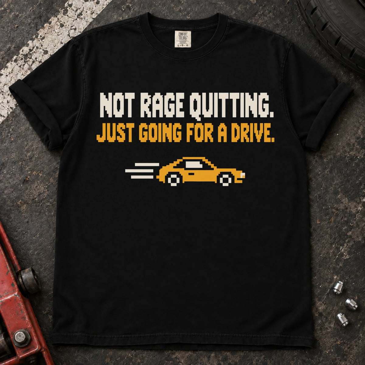 Black car enthusiast T-shirt. A pixel car drives away: not rage quitting, just going for a drive.