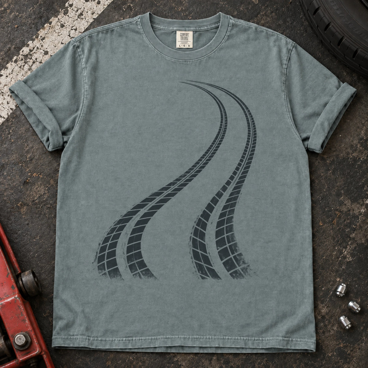 Bay car enthusiast T-shirt. Two curving tire tracks capture a minimalist rear-bias driving graphic.
