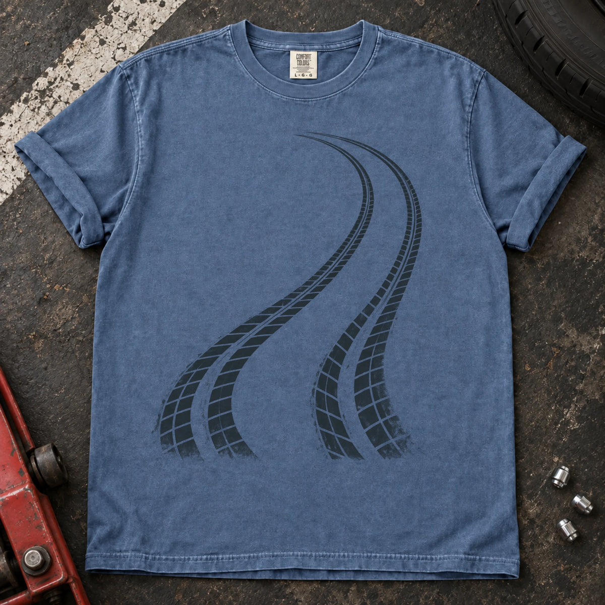 Blue Jean car enthusiast T-shirt. Two curving tire tracks capture a minimalist rear-bias driving graphic.