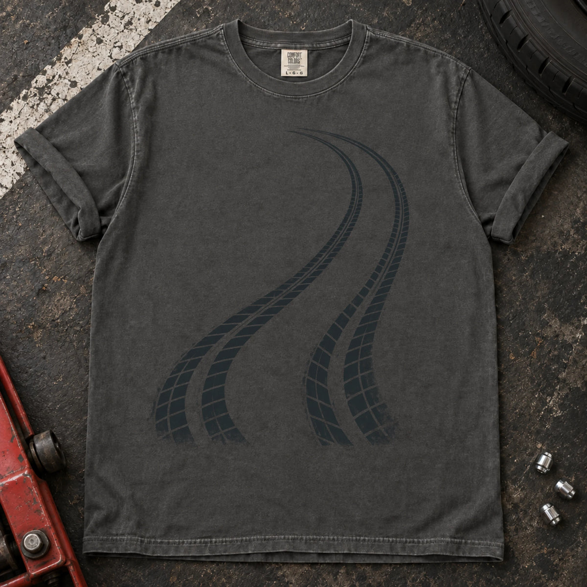 Pepper car enthusiast T-shirt. Two curving tire tracks capture a minimalist rear-bias driving graphic.