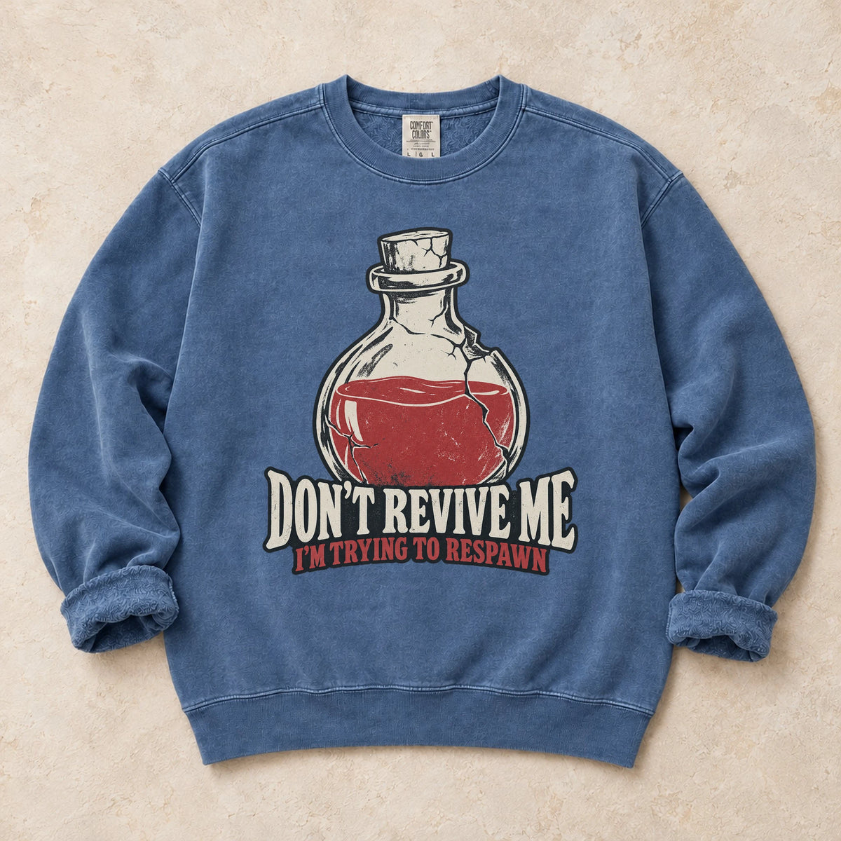 Blue Jean gaming sweatshirt. A potion asks don't revive me, I'm trying to respawn.