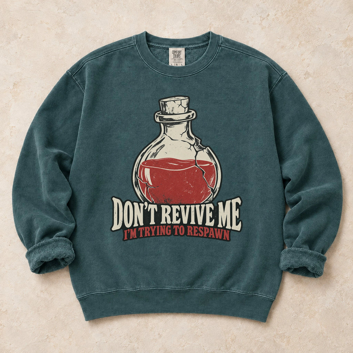 Blue Spruce gaming sweatshirt. A potion asks don't revive me, I'm trying to respawn.