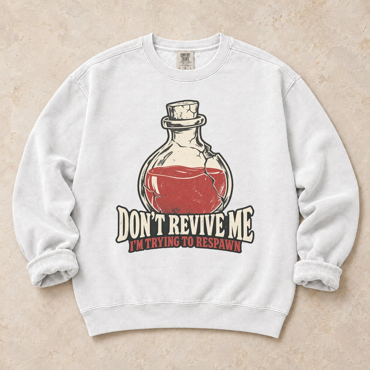 White gaming sweatshirt. A potion asks don't revive me, I'm trying to respawn.