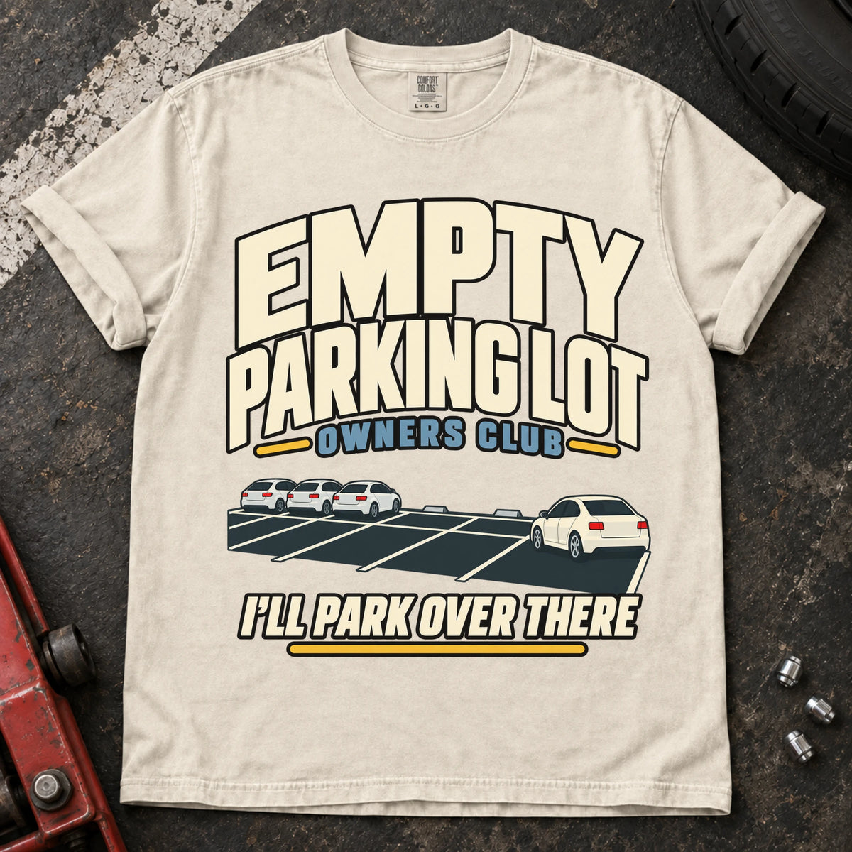 Ivory car enthusiast T-shirt. A distant car joins the Empty Parking Lot Owners Club, I'll park over there.