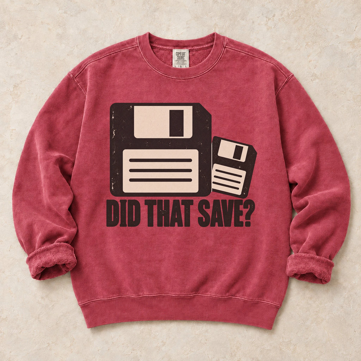 Crimson gaming sweatshirt. Two floppy disks ask the worried gamer question, did that save?