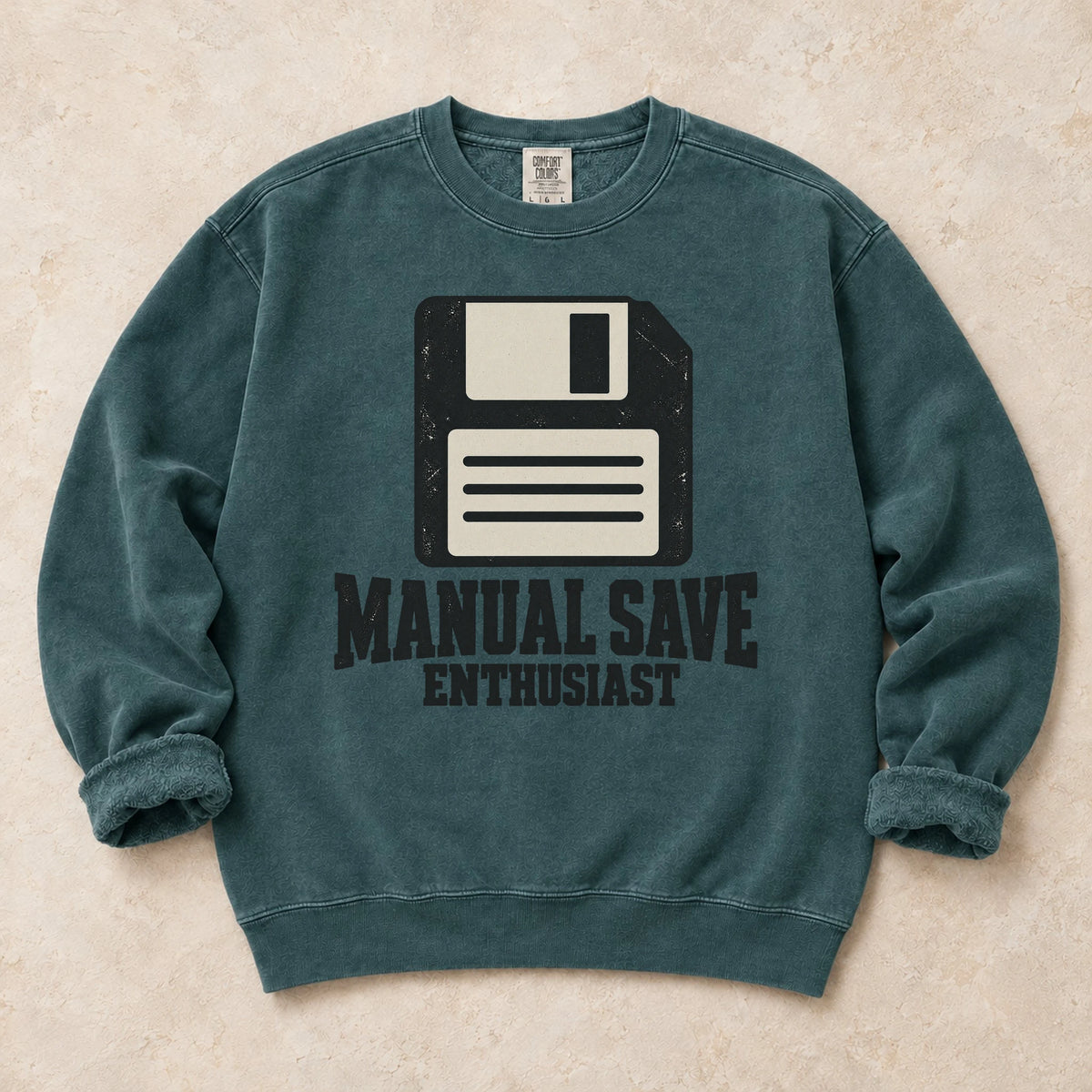 Blue Spruce gaming sweatshirt. A floppy disk celebrates the manual save enthusiast.