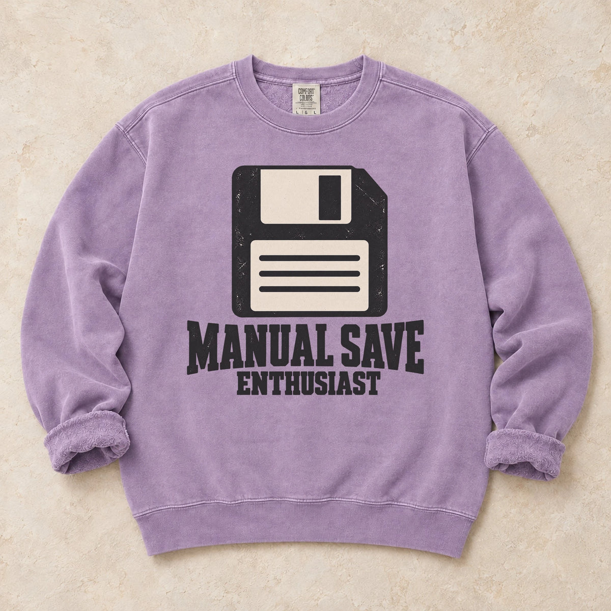 Orchid gaming sweatshirt. A floppy disk celebrates the manual save enthusiast.