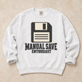White gaming sweatshirt. A floppy disk celebrates the manual save enthusiast.