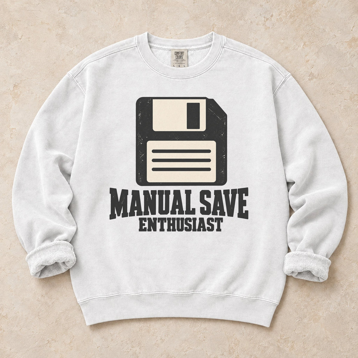 White gaming sweatshirt. A floppy disk celebrates the manual save enthusiast.