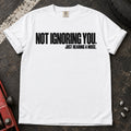 White car enthusiast T-shirt. Not ignoring you, just hearing a noise: understated car-owner typography.