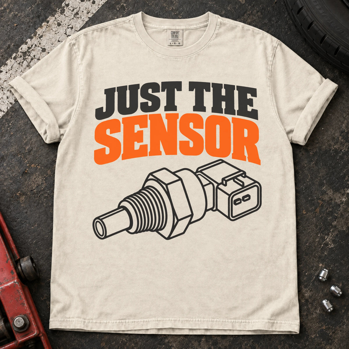 Ivory T-shirt with a mechanical sensor illustration and bold 'Just the sensor' lettering.