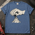 Blue Jean car enthusiast T-shirt. A hand on a gear lever celebrates the small ritual of manual shifting.
