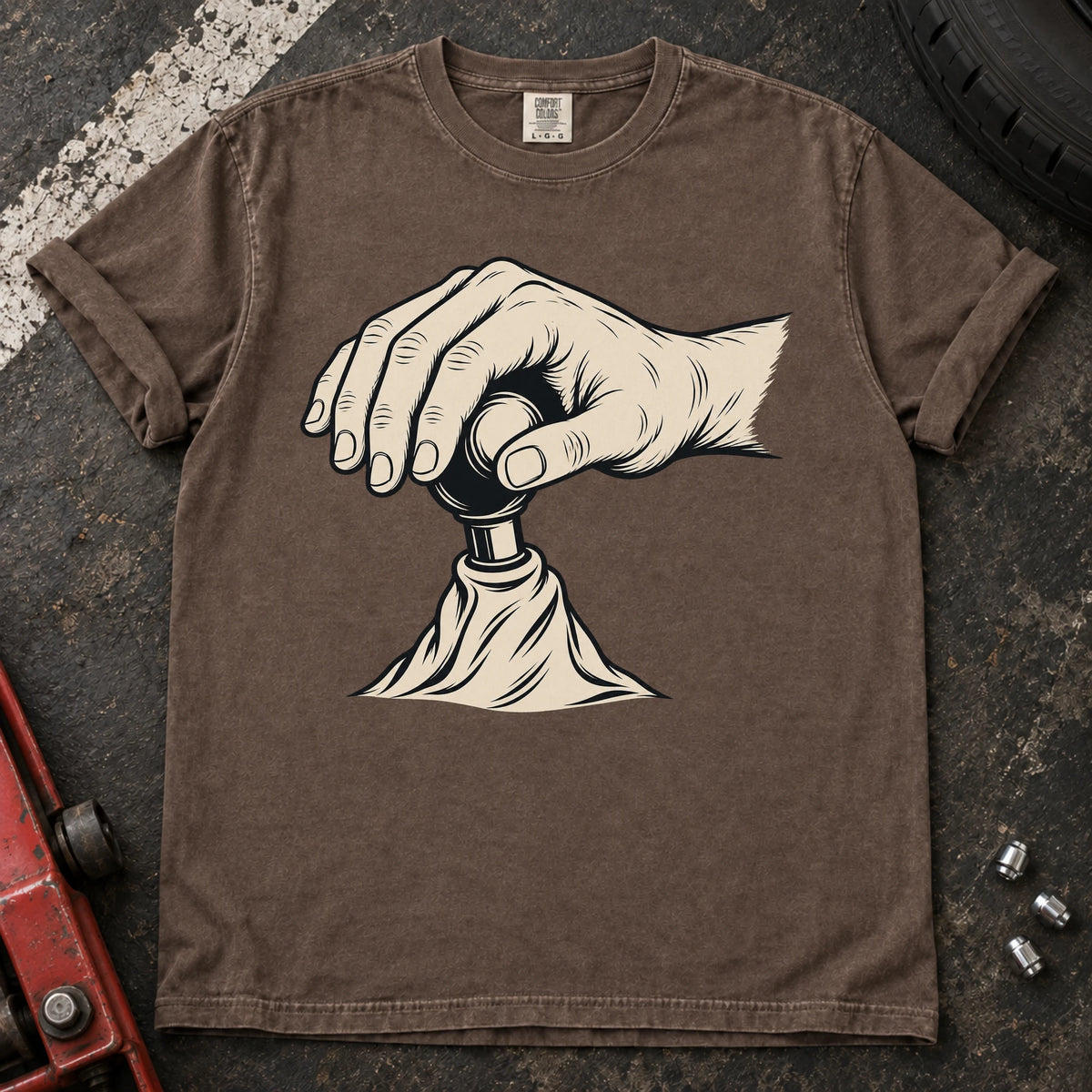 Espresso car enthusiast T-shirt. A hand on a gear lever celebrates the small ritual of manual shifting.