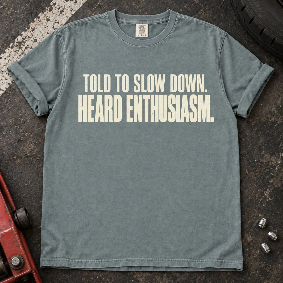 Bay car enthusiast T-shirt. Told to slow down, heard enthusiasm: bold self-aware driving humor.