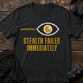 Black gaming T-shirt. A wide eye announces stealth failed immediately.