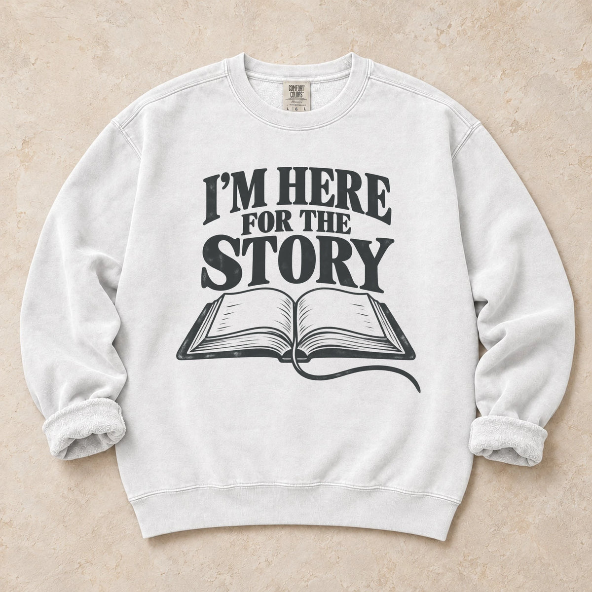 White gaming sweatshirt. An open book declares I'm here for the story.