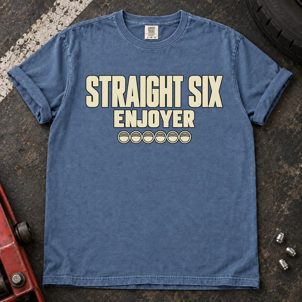Blue Jean car enthusiast T-shirt. Six small cylinder symbols accompany Straight Six Enjoyer lettering.