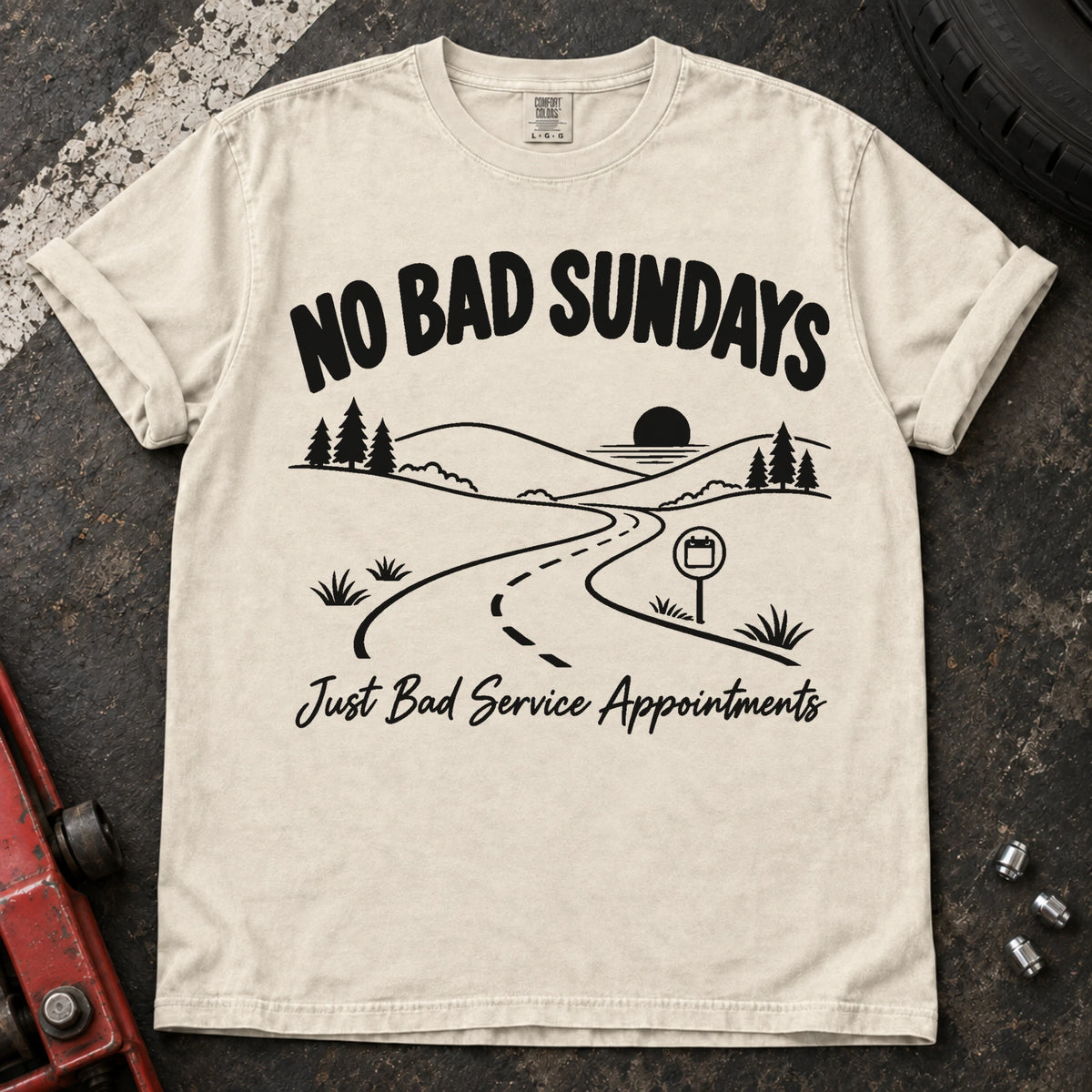 Ivory car enthusiast T-shirt. A scenic road admits no bad Sundays, just bad service appointments.