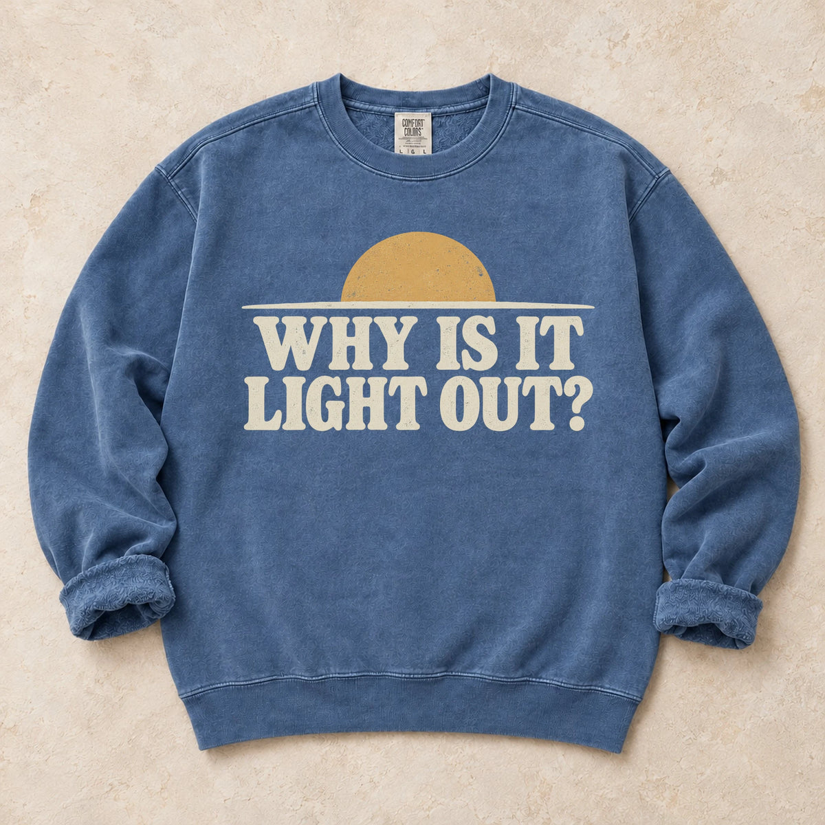 Blue Jean gaming sweatshirt. A sun above the horizon asks the late-night player, why is it light out?