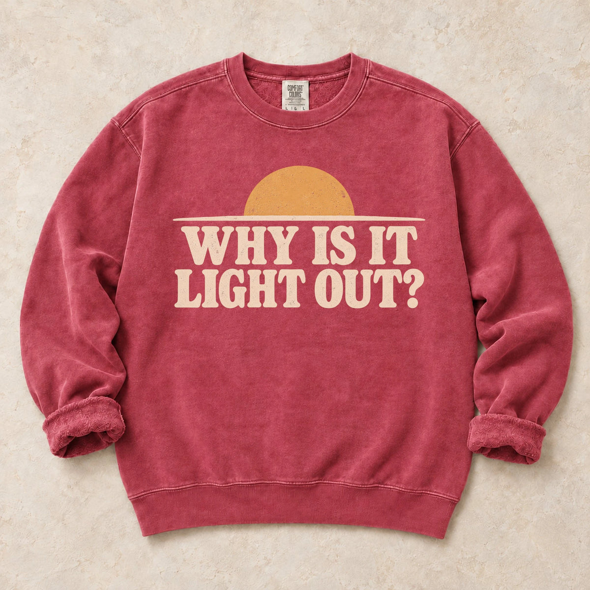 Crimson gaming sweatshirt. A sun above the horizon asks the late-night player, why is it light out?