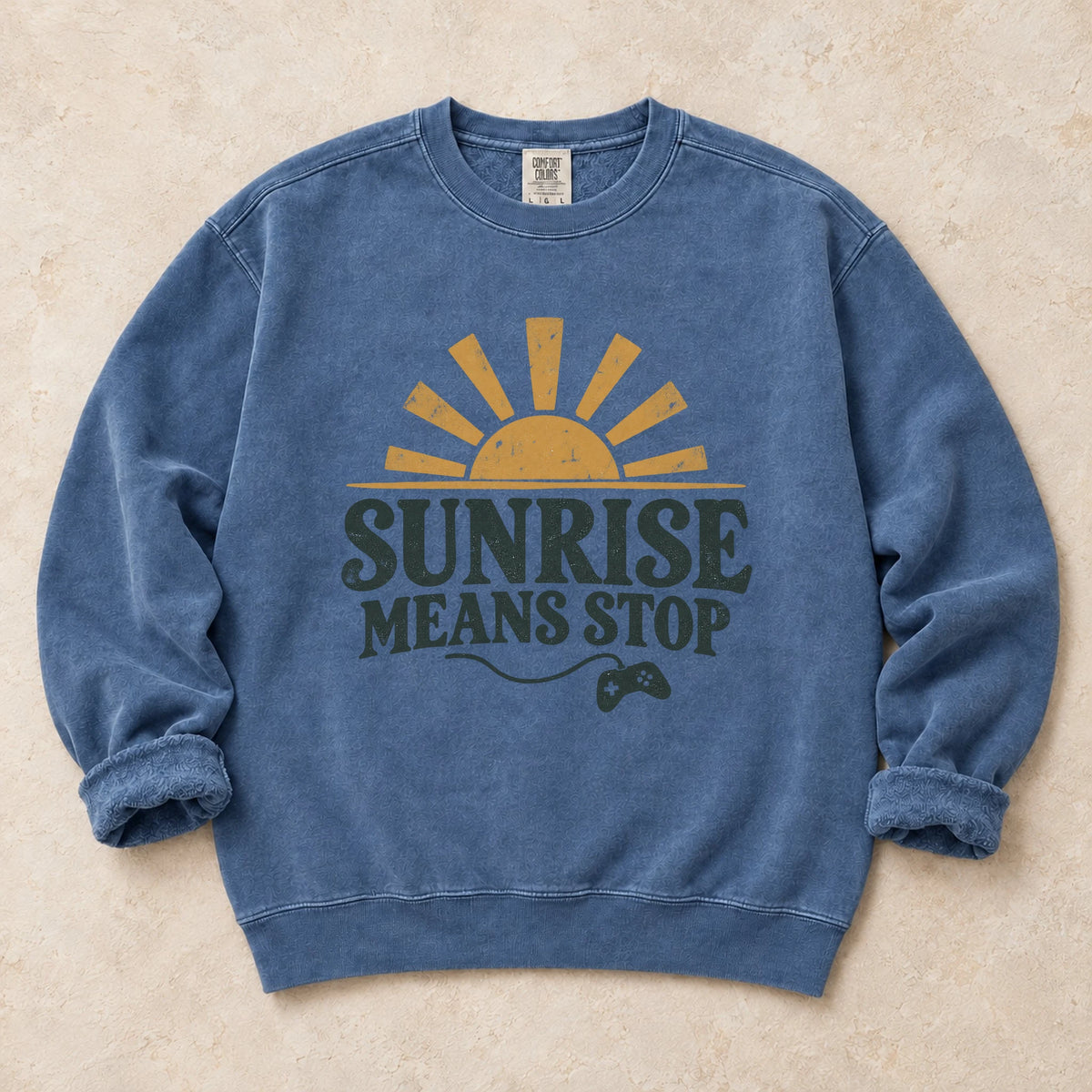 Blue Jean gaming sweatshirt. A rising sun and controller remind night gamers that sunrise means stop.